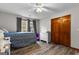 Cozy bedroom featuring a twin bed and built-in wooden closet at 206 Sandown Drive, Peachtree City, GA 30269