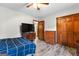 Spacious bedroom with a TV, dresser, and large closet at 206 Sandown Drive, Peachtree City, GA 30269