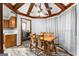 Bright dining room with wood table and chairs, and a vaulted ceiling at 206 Sandown Dr, Peachtree City, GA 30269