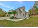 House exterior showcasing a patio and expansive backyard at 125 Fawn Brook Pass, Fayetteville, GA 30215