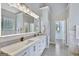 Bathroom with double vanity and large mirror at 125 Fawn Brook Pass, Fayetteville, GA 30215