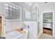 Bathroom with soaking tub and walk-in shower at 125 Fawn Brook Pass, Fayetteville, GA 30215