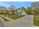 Driveway leading to a two-story house at 125 Fawn Brook Pass, Fayetteville, GA 30215