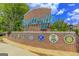 Fayetteville town entrance sign with local organization logos at 125 Fawn Brook Pass, Fayetteville, GA 30215