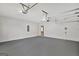 Spacious garage with epoxy flooring and access to house at 125 Fawn Brook Pass, Fayetteville, GA 30215