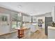 Modern kitchen with white cabinets, stainless steel appliances, and an island at 125 Fawn Brook Pass, Fayetteville, GA 30215