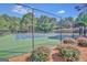 Two tennis courts surrounded by a chain link fence at 125 Fawn Brook Pass, Fayetteville, GA 30215