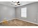 Simple bedroom with grey walls and carpet at 6350 Park St, Union City, GA 30291