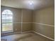 Spacious bedroom with large window and neutral wall colors at 3502 Tiffany Se Dr, Conyers, GA 30013