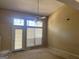 Living room with vaulted ceiling, fireplace and patio door at 3502 Tiffany Se Dr, Conyers, GA 30013