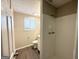 Clean bathroom with shower and updated toilet and flooring at 2959 Fairburn Rd, Atlanta, GA 30331