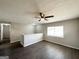 Spacious living room featuring vinyl flooring and a half-wall at 2959 Fairburn Rd, Atlanta, GA 30331
