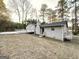 House back view with deck and backyard at 1618 Old Alabama Rd, Austell, GA 30168