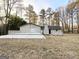 House exterior showcasing a deck and backyard at 1618 Old Alabama Rd, Austell, GA 30168