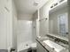 Updated bathroom with a shower stall and granite vanity at 1618 Old Alabama Rd, Austell, GA 30168