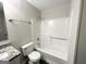 Clean bathroom with a tub/shower combo and granite vanity at 1618 Old Alabama Rd, Austell, GA 30168