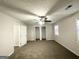 Spacious bedroom with carpet flooring and double closets at 1618 Old Alabama Rd, Austell, GA 30168