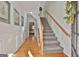 Bright entryway with hardwood floors and staircase at 32 American Walk, Peachtree City, GA 30269