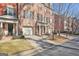 Brick townhouse with attached garage and front porch at 32 American Walk, Peachtree City, GA 30269
