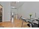 Upstairs hallway with hardwood floors and a view of another room at 32 American Walk, Peachtree City, GA 30269