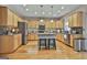 Modern kitchen with granite counters, stainless steel appliances and an island at 32 American Walk, Peachtree City, GA 30269