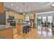 Modern kitchen with granite counters, stainless steel appliances, and an island at 32 American Walk, Peachtree City, GA 30269