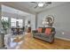 Living room with hardwood floors and comfortable seating at 32 American Walk, Peachtree City, GA 30269
