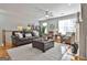 Living room with fireplace and comfortable seating at 32 American Walk, Peachtree City, GA 30269