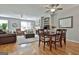 Spacious living room with hardwood floors, fireplace and comfortable seating at 32 American Walk, Peachtree City, GA 30269