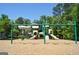 Playground with swings, slides, and climbing structures at 32 American Walk, Peachtree City, GA 30269