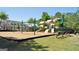 playground with swings and slides at 32 American Walk, Peachtree City, GA 30269