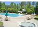 Community pool with water slide and hot tub at 32 American Walk, Peachtree City, GA 30269
