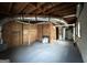 Unfinished basement with exposed utilities and concrete floor at 3138 Beechwood Dr, Lithia Springs, GA 30122