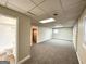 Large basement area with new carpet and multiple windows at 3138 Beechwood Dr, Lithia Springs, GA 30122