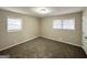 Bright bedroom with neutral carpeting and window blinds at 4037 Regent St, Douglasville, GA 30134