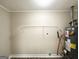Laundry area with shelving and water heater at 4037 Regent St, Douglasville, GA 30134