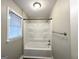 Clean bathroom with a shower/tub combo and neutral tones at 121 Pine Forest Dr, Dallas, GA 30157