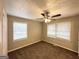 Bright bedroom with neutral decor and carpet flooring at 121 Pine Forest Dr, Dallas, GA 30157