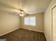 Spacious bedroom with neutral carpeting and window blinds at 121 Pine Forest Dr, Dallas, GA 30157