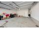 Spacious garage with high ceilings, offering ample storage, and potential for workshop space at 319 Allegrini Dr, Atlanta, GA 30349