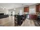 Inviting living room with an open-concept layout flowing into a spacious kitchen and featuring modern countertops at 319 Allegrini Dr, Atlanta, GA 30349