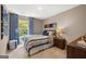 Bedroom with blue and white bedding, and wood nightstand at 300 Silver Moon Drive, Loganville, GA 30052