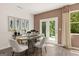 Modern dining room featuring an oval table and stylish chairs at 300 Silver Moon Drive, Loganville, GA 30052