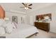 Main bedroom with ceiling fan and large dresser at 300 Silver Moon Drive, Loganville, GA 30052