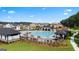 Resort-style pool with cabanas and lounge chairs at 300 Silver Moon Drive, Loganville, GA 30052