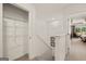 Upstairs hallway with linen closet and bedroom access at 300 Silver Moon Drive, Loganville, GA 30052