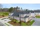 Luxury townhome with 3-car garage and landscaped yard at 596 Silver Moon Drive, Loganville, GA 30052