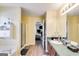 Bathroom with shower, tub, and double vanity at 3153 Sweetbriar Dr, Villa Rica, GA 30180