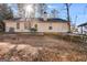 House exterior with backyard and trampoline at 3153 Sweetbriar Dr, Villa Rica, GA 30180