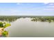 Scenic view of a tranquil lake with houses along the shore at 3153 Sweetbriar Dr, Villa Rica, GA 30180